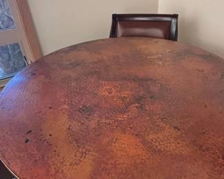 Hammered Copper Top Dining Table with Wrought Iron Base and Upholstered Chairs second image