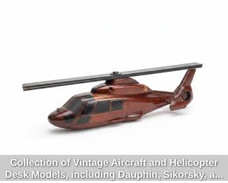 Collection of Vintage Aircraft and Helicopter Desk Models, including Dauphin, Sikorsky, and Concorde