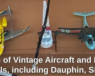 Collection of Vintage Aircraft and Helicopter Desk Models, including Dauphin, Sikorsky, and Concorde fourth image