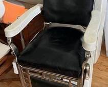 Theo A Koch Chicago Victorian Era Barber Chair. Porcelain arms, leather seat and back. Chrome.