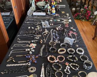Lots of necklaces and bracelets