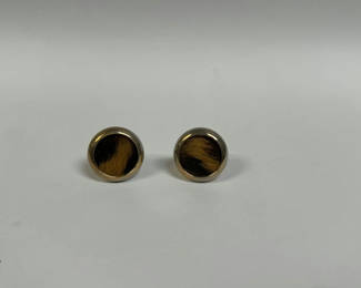 Lot 27: Pair of Lion Fur Cufflinks