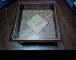 Copper colored glass tile on the bottom very heavy and table