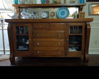 This sidebar is from downtown Chicago a remodeled bar would original mirror glass. Drawers and glass doors original