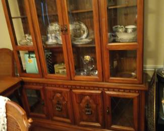 '70S china cabinet dishes inside is friendly village by Johnson Brothers they are seconds so there are some factory misfires and some chips