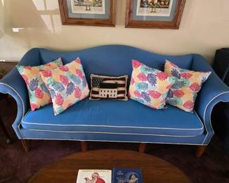 Blue Pennsylvania House camelback sofa features elegant rolled arms and crisp white contrast piping. Excellent condition!