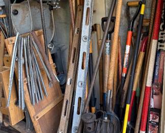 TONS OF YARD TOOLS SHOVELS, RAKES ETC..