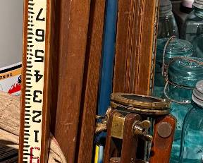 TRANSIT TRIPODS AND VINTAGE SURVEYING EQUIPMENT  