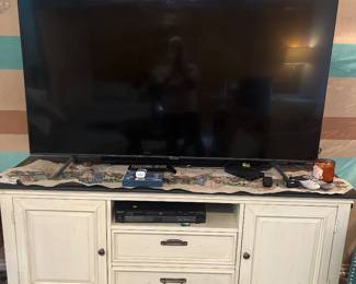 Entertainment Center and 65 Inch Samsung TV
