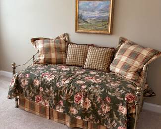 brass day bed with two two beds, one is a trundle that slides underneath, beautiful bedding