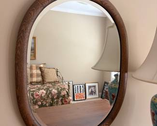 Several wood mirrors