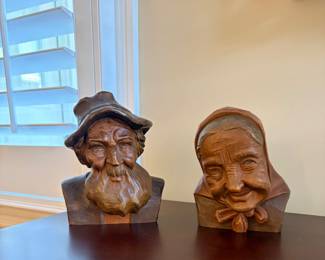 Black Forest carved bust of elderly man and woman