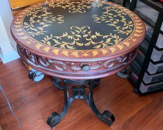Round table with wrought iron legs