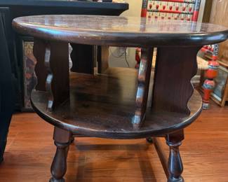 Round wooden table with lazy Susan top