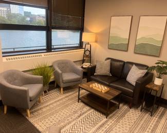 One of 12 rooms containing modern furniture and decor.