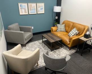 One of 12 rooms containing modern furniture and decor.