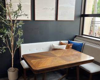 One of three matching modern dining tables by Bernards Furniture Group, and one of two matching Bernards Dorval white and wood modular corner dining nook benches.