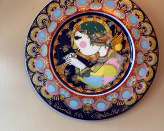 Bjørn Wiinblad for Rosenthal Studio-Line “Weihnachten 1976 – Angel with Trumpet” porcelain Christmas collector plate, hand-decorated with vibrant colors and gold accents, Germany. Approximately 11¼"