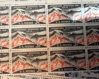 1958 U.S. International Geophysical Year 3¢ Commemorative Stamps – Mint Multiples, Scott #1107, dramatic design combining Michelangelo’s Creation of Adam hands with solar imagery, issued to commemorate the International Geophysical Year 1957–58.