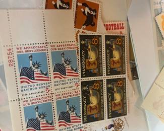 Vintage U.S. Mint Postage Stamp Blocks – U.S. Savings Bonds 25th Anniversary 5¢ “We Appreciate Our Servicemen” Plate Block & 1972 Pharmacy 8¢ Commemorative Block, plus assorted Humane Treatment of Animals and Football commemorative stamps.