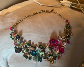 Necklace with green , blue crystals and red rhinestones