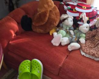 Box of crocs (couch is not for sale)