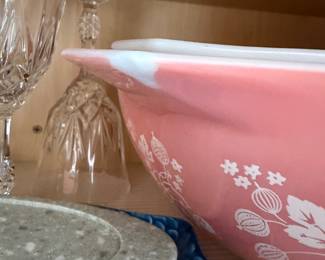 Pink Pyrex bowl with chip