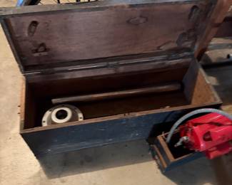 Old box with pipe tool