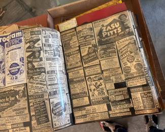 Scrapbook of theater newspaper clippings