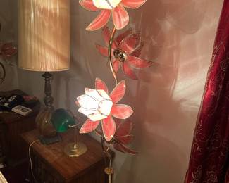 Vintage Pink Lotus Floor Lamp  Description: Stunning brass-finish floor lamp featuring glowing pink and white lotus flower shades.  Condition: Good vintage condition, tested and working.