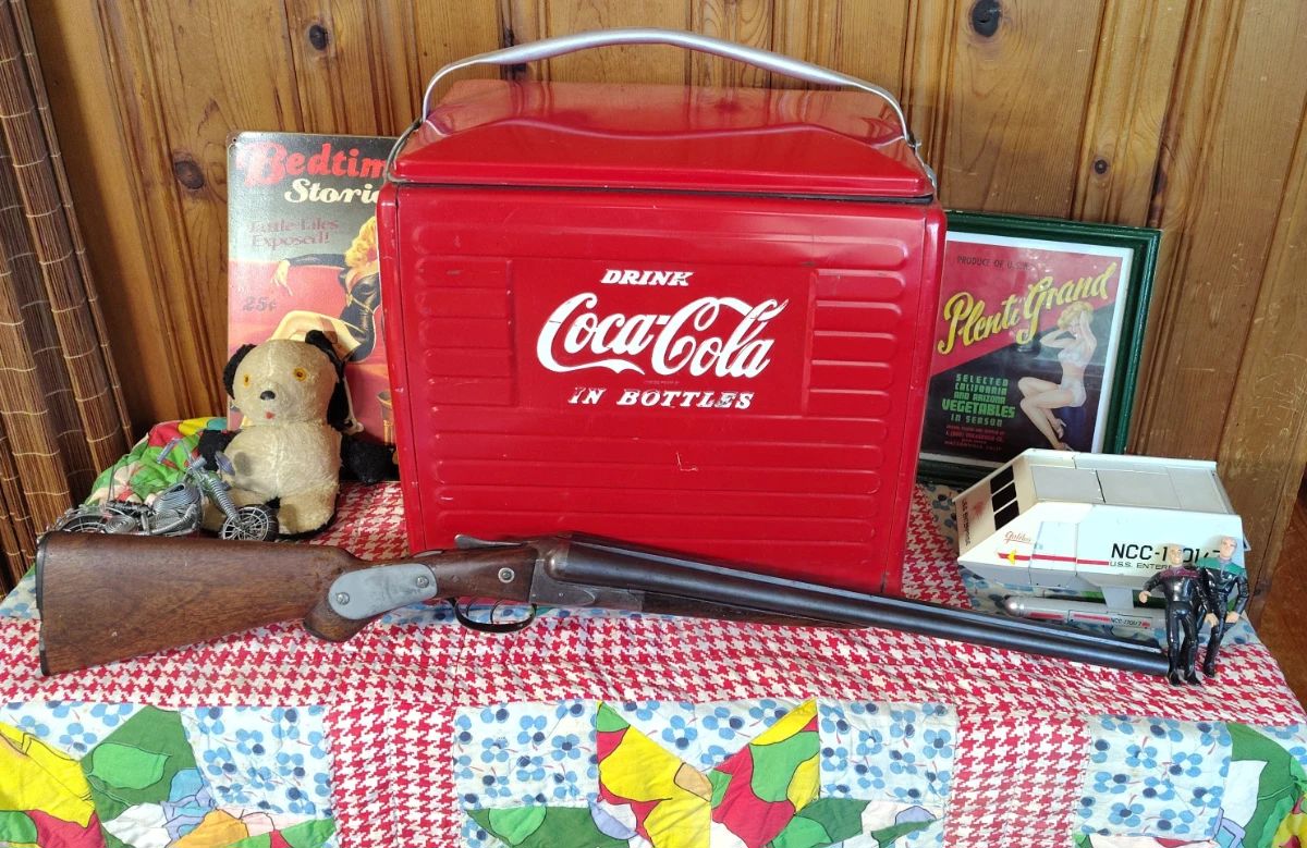 Vintage coca cola cooler with star trek toys and pinups
