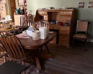 Oak roll up desk and pack table with 8 chairs 