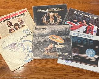 Vintage Vinyl Records with Artist Signatures