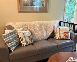 Modern gray leather sofa in great condition.