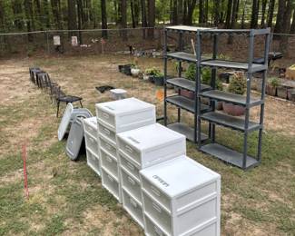 Assorted plastic drawer storage units, heavy-duty shelving, folding tables, stools, plant stands and more.