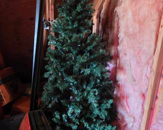 Upstairs in bonus area storage - Christmas tree, bed rails and more