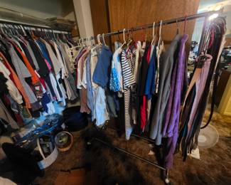 Upstairs - More clothes in closet with an extra rack of clothes!