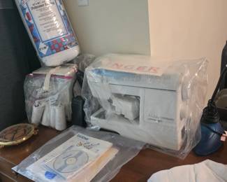 Upstairs - items on top of desk - same Singer sewing machine