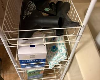 Another wire storage , lens wipes and more