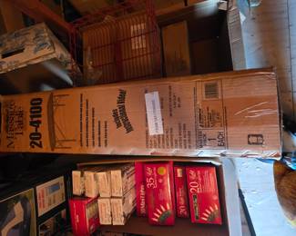Upstairs in bonus area storage - Christmas lights (some new). Massage table (new),