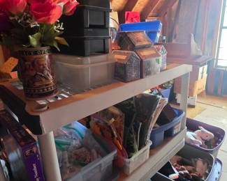 Upstairs in bonus area storage -lots of new items, containers in various sizes games & more