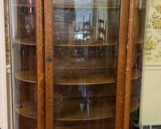 Edwardian style turn of the century Oak curved glass curio with claw feeet
