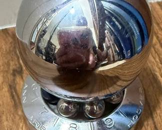 Vintage Hoover Ball Bearing paperweight,chrome finish, spins on bearings as a Decision Maker dek toy with engraved numbers