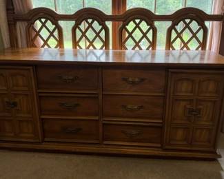 Vintage Drexel Heritage Guiildhall Collection tripledoor dresser, solid Walnut, Colonial Early American in back is Drexel Heritage King Headboard