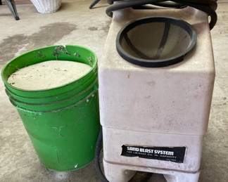Sand Blaster, bucket of sand