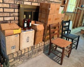 Cases and cases of wine cane and ladderback chairs