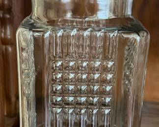 Vintage Koezes clear glass apothecary canister with ribbed panels and textured diamondquilted hobnail center