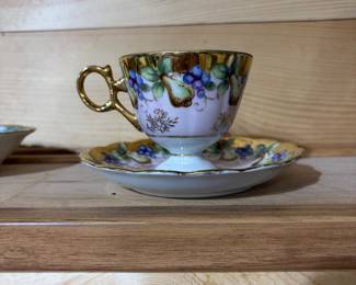 Vintage Royal Sealy footed teacup and saucer with fruit motif