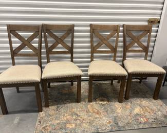 showing 4 of the 6 upholstered dining chairs