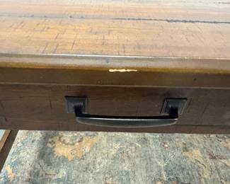 small paint loss/scratch on desk